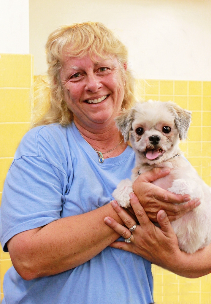 Lora Heidrich holding a dog